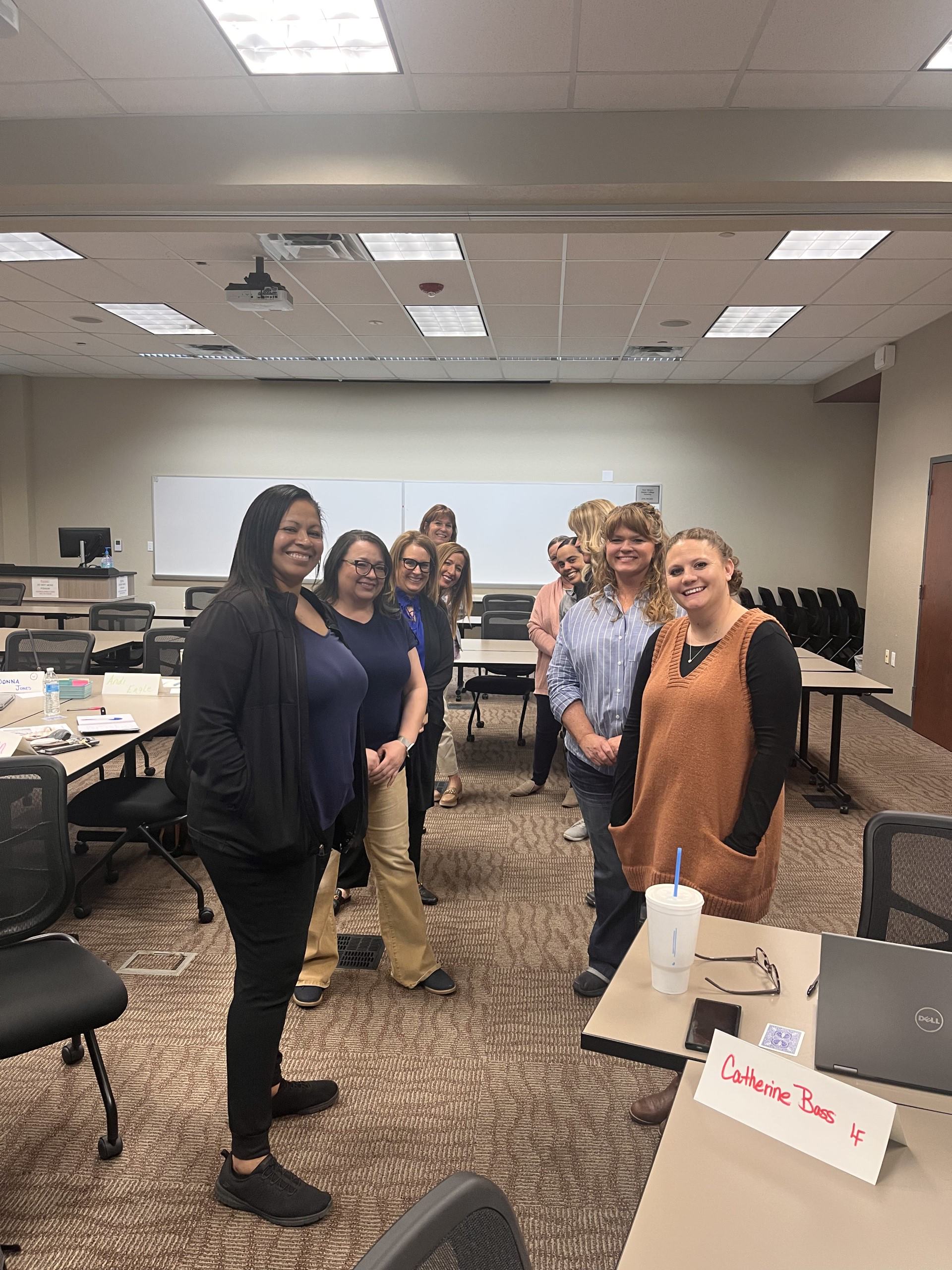Employees in meeting room together