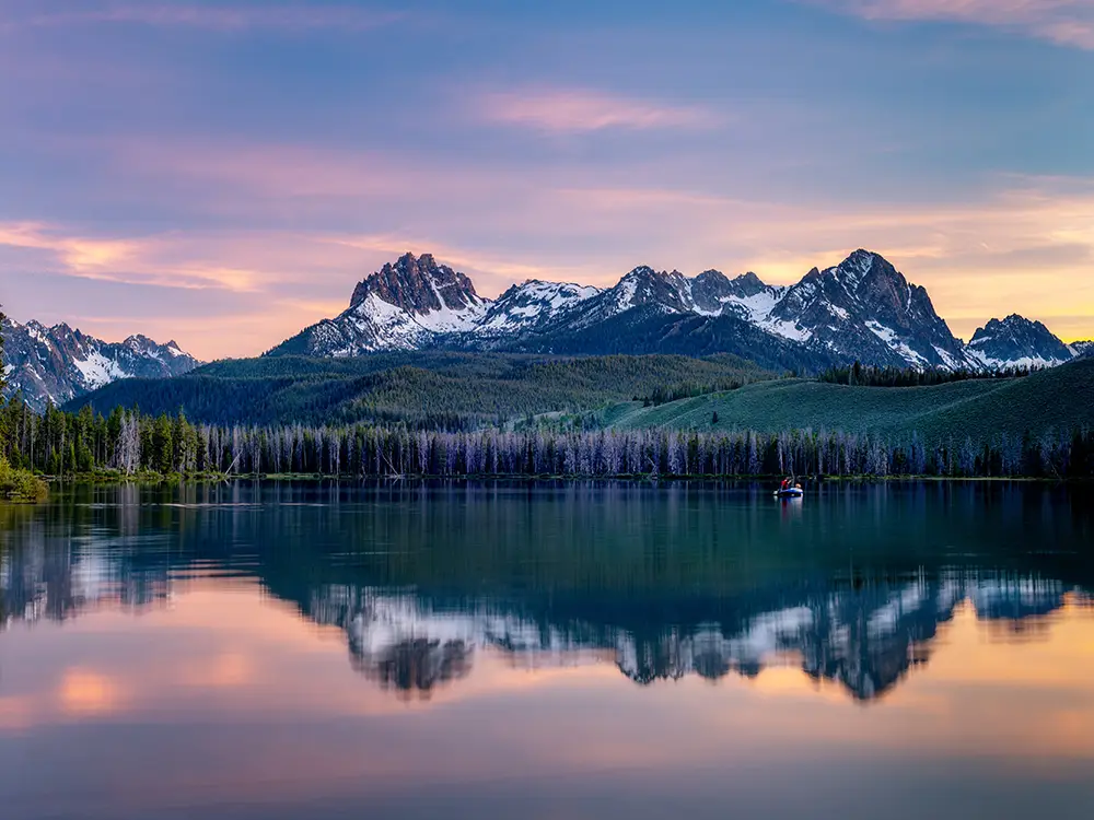 Lake showing the reflection of distant mountains